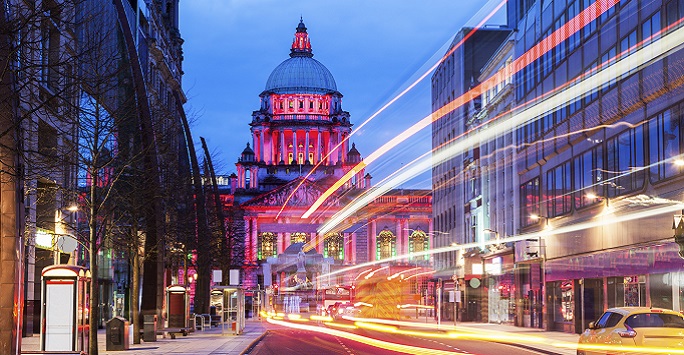 Belfast buildings at dusk taken on long exposure so traffic headlights produce light trails