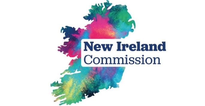 multicoloured island of ireland with new ireland commission in bold text