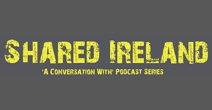 shared ireland logo - 'a conversation with' podcast series written in yellow block writing on a grey background