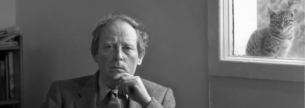 Black and white image of John McGahern with his cat