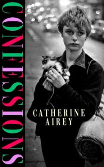 Book Cover for CONFESSIONS by Catherine Airey, showing a black and white image of a woman with short hair. The woman is holding a small cat in her hands and hasa rolled up sleeping bag slung across her shoulder. The blurred background shows cars with their headlights on.