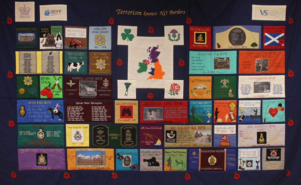 Colourful memorial quilt with patches