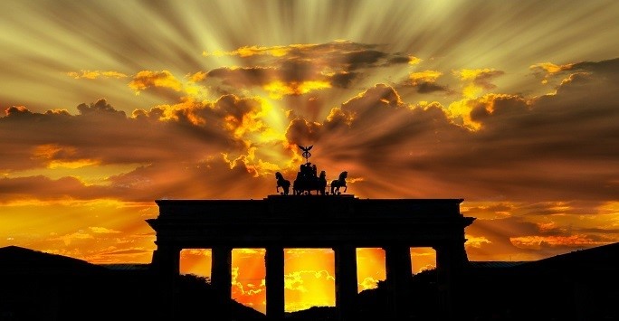 brandenburg gate in front of Berlin sunset