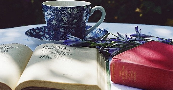 poetry book with a cup of tea