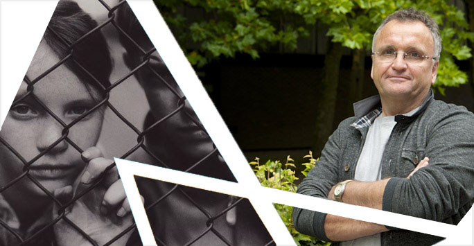 Prof Barry Goldson plus a black and white image of two children behind fencing