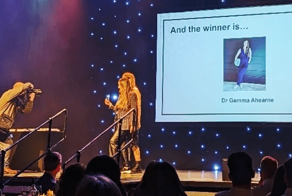 Gemma Ahearne receiving her award on stage at the Guild Awards 2023