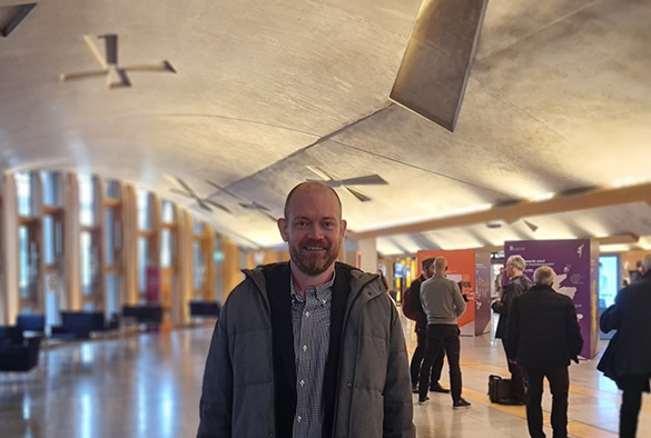 Dr John Picton inside the Scottish Parliament building, Holyrood, Edinburgh.