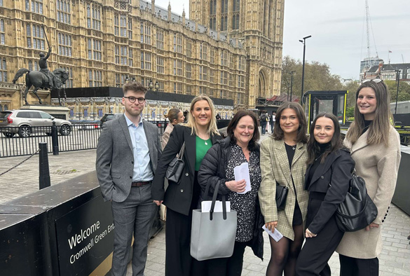 Family Advice Project students with Helenor Birt outside of the House of Commons