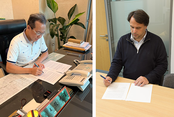 Academy President, Sheng-Shin Chang (left), and Dean of SLSJ, Valsamis Mitsilegas, signing the MoU.