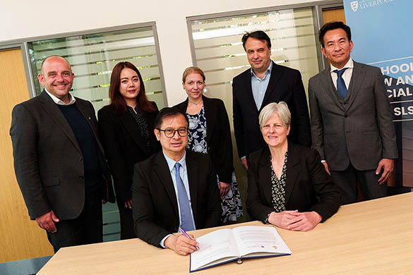 Group photo of the MoU signing with SLSJ colleagues and the Office of the Judiciary of Thailand