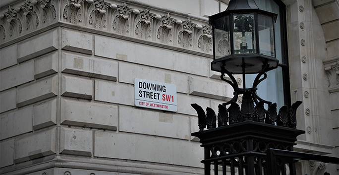 A picture showing the 'Downing Street' street sign