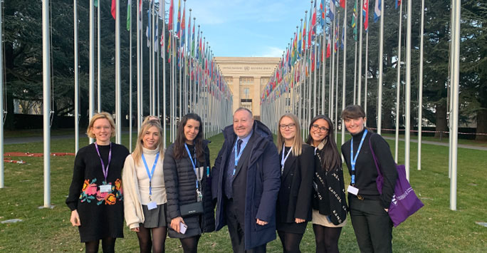 From left, Dr Katie Johnston, Charlotte Clayton-Hayes, Leticia Marcati, Dr Vassilis Tzevelekos, Emily Pierce, Trian Smith and Sarah Devers outside the Palais des Nations.