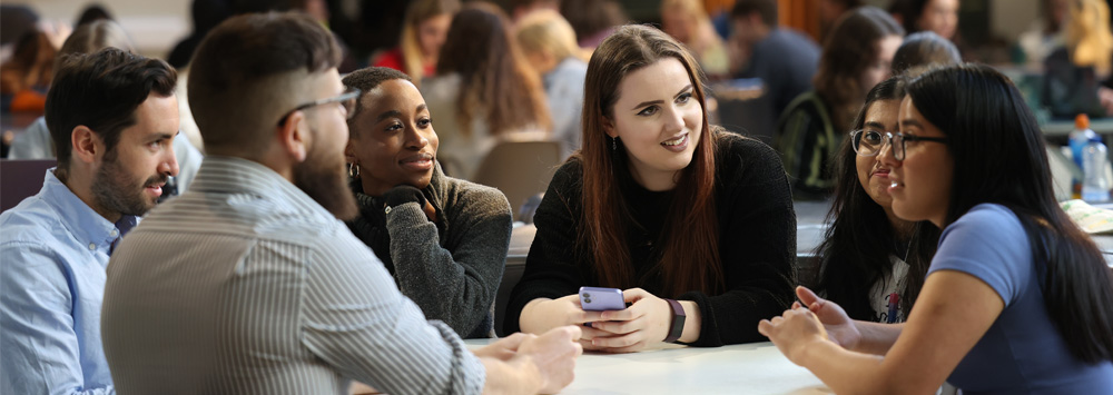 A group of student sat around a large table