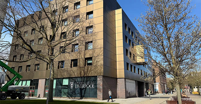 SLSJ building side-on (bronze panelling shining in the sun)