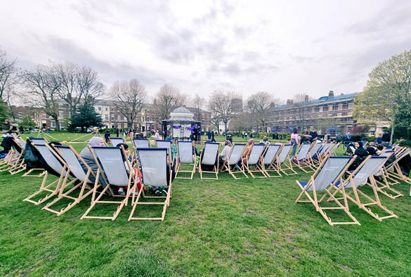 A collective of chairs on Abercromby Square reading for the event.
