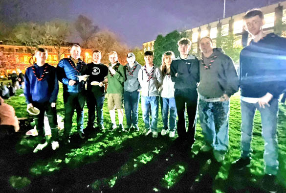 A group of people celebrating Iftar in the night time.