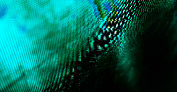 A close up photo of a digital screen with black and green pixels