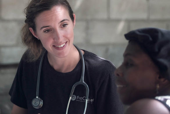 A female carer looking after a female patient