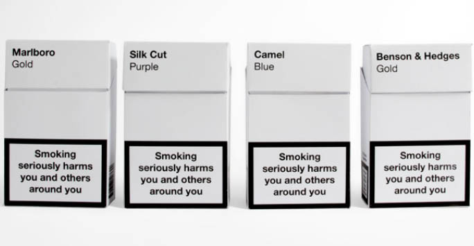A photo of 4 plain packaged cigarette packets
