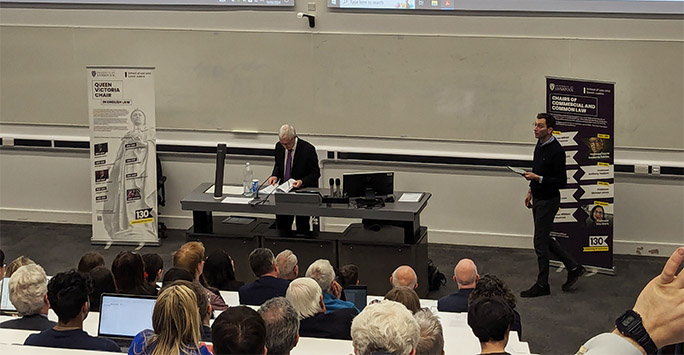 Lord Burrows and Dr Thomas Horsley at the front of the Brett Lecture Theatre