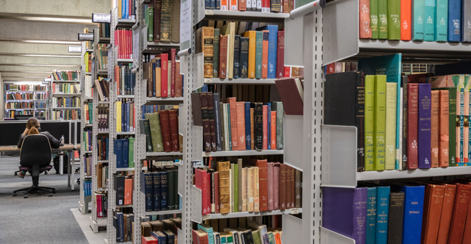 Shelves of a library filled with law books