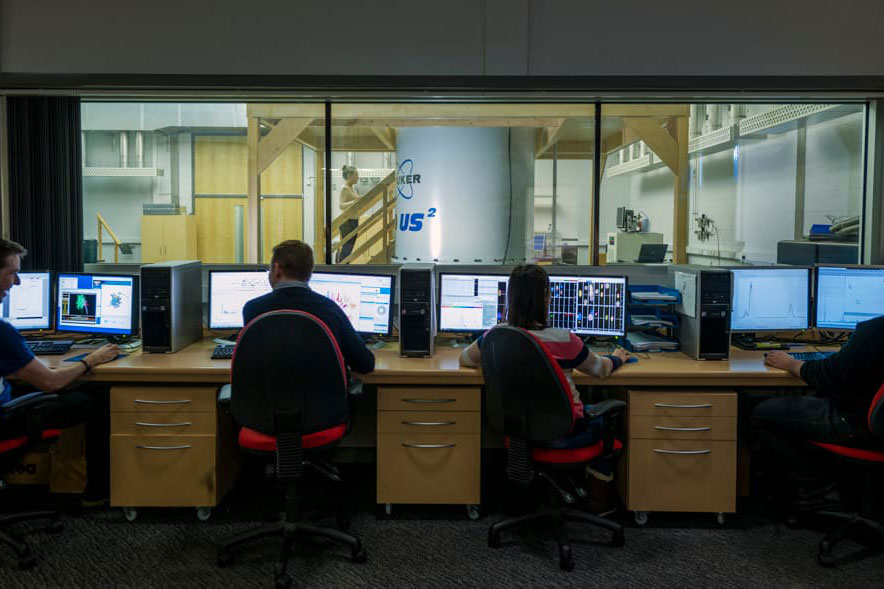 People at desks on computers