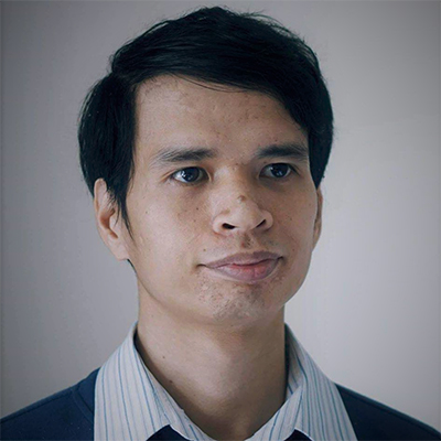 A person posing for a photo.