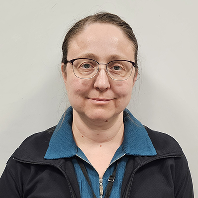 A person posing for a photo.