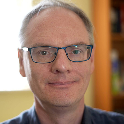 A person posing for a photo.