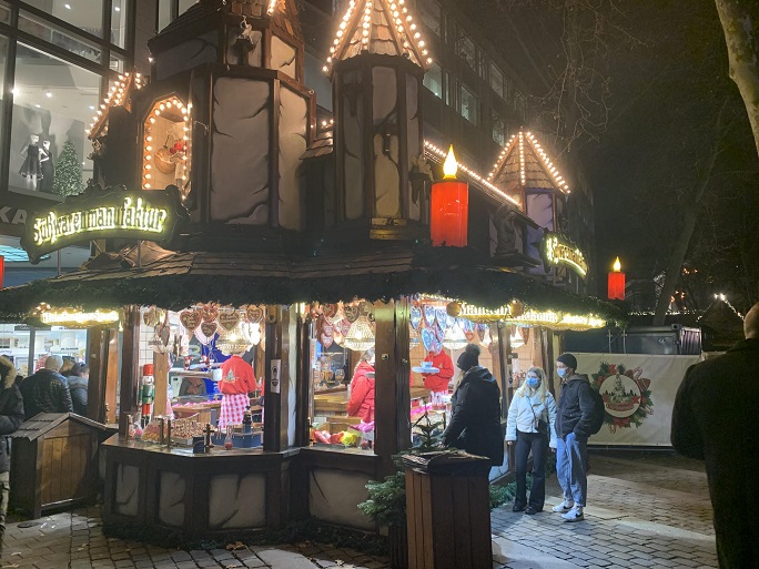 German Christmas market food stall at night