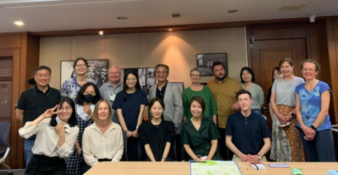 Group of network members from Sogang University, National Musuems Liverpool, and  Liverpool and Liverpool John Moores Universities seated around a table after the final day’s seminar activities at the Critical Global Studies Institute, Sogang University, Seoul