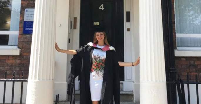 Student in graduation gown and cap