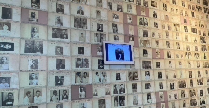 Display of Prisoner ID cards using analogue photographs alongside digital touchscreen technology, Seodaemun Prison History Hall, Seoul