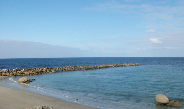 A beach with blue sky