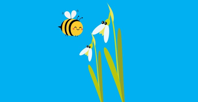 Bumble bee and two snowdrop flowers