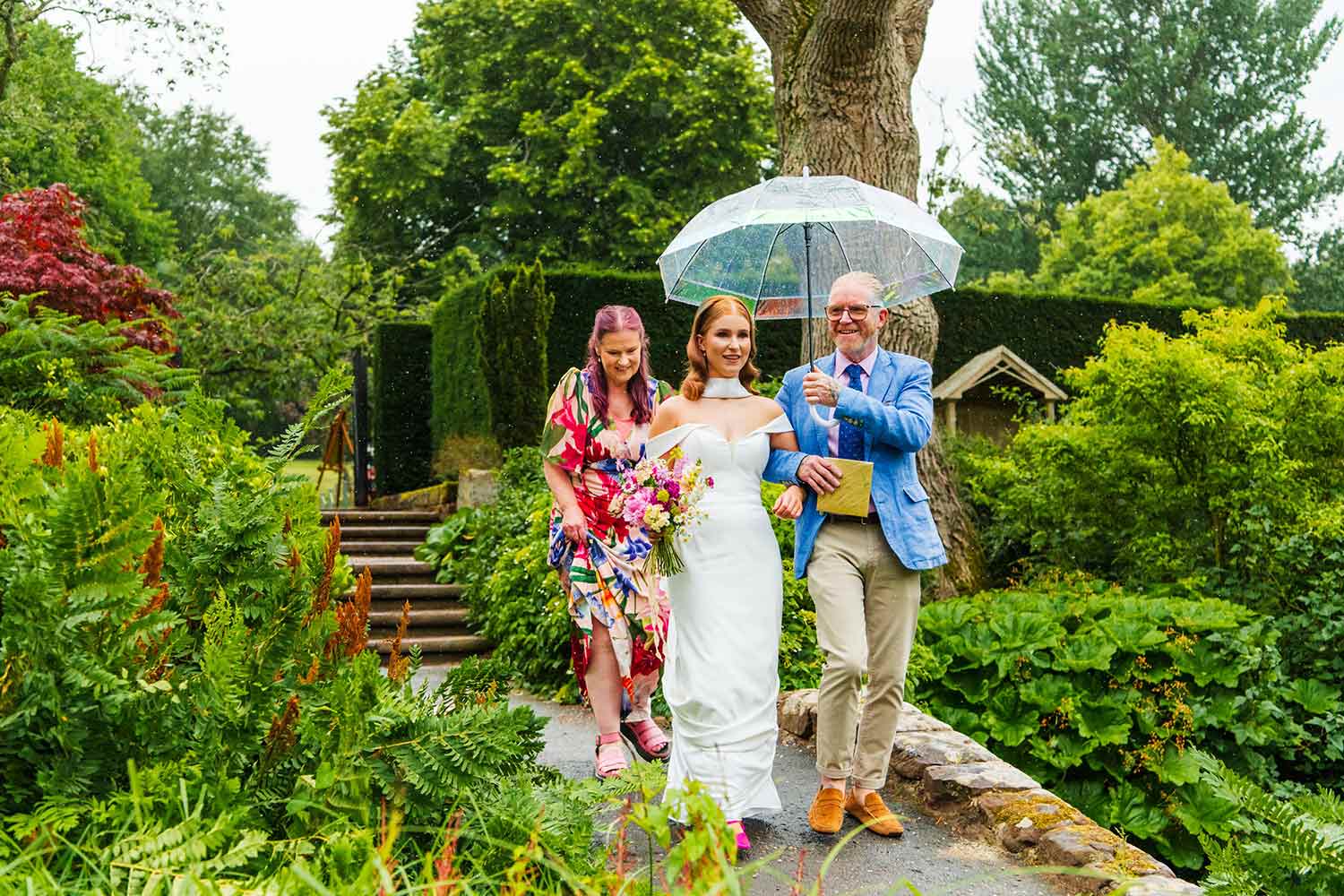 A bride walks through the Rock Garden ahead of a wedding ceremony.