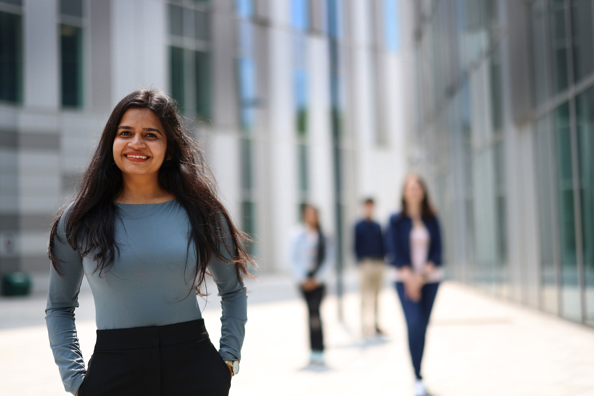 Postgraduate international student, Drishya Jayaknshnan, smiling to camera