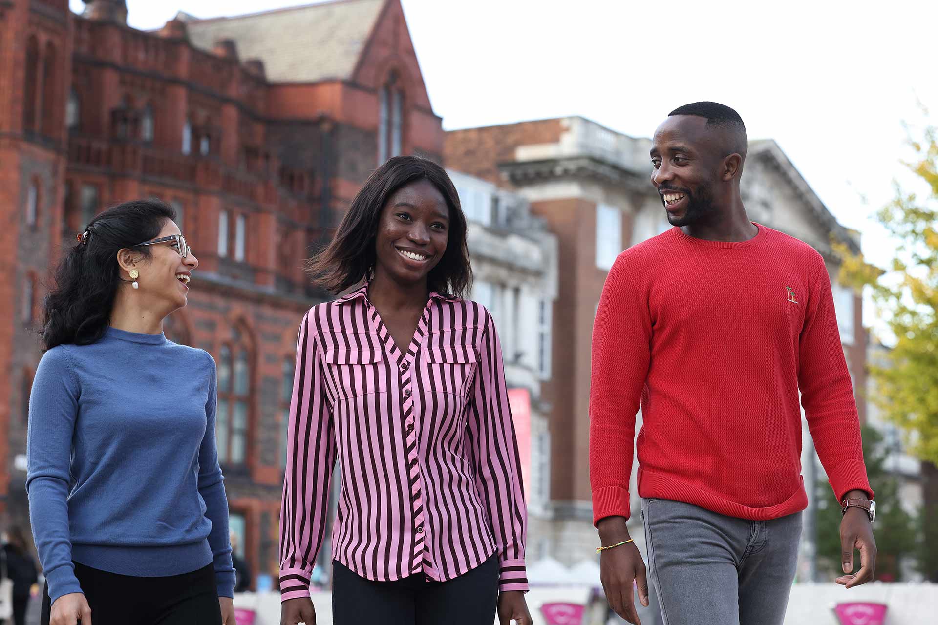 Three students walking near the Victoria Gallery & Museum.