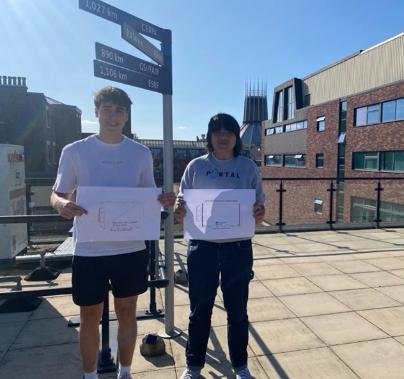Sam and Lennox showing their results