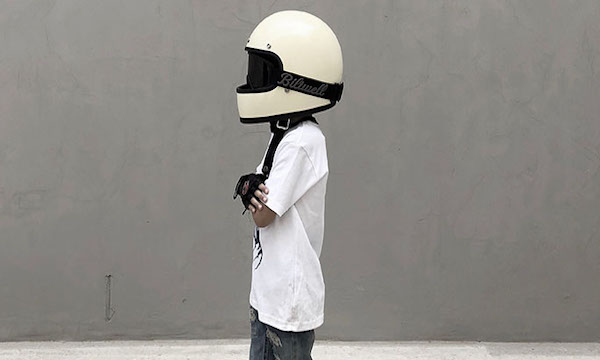 Young person wearing helmet