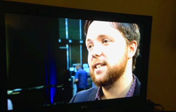 Man being interviewed on tv