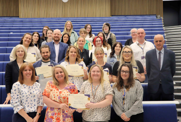 A group photo of some of the winners of the staff awards
