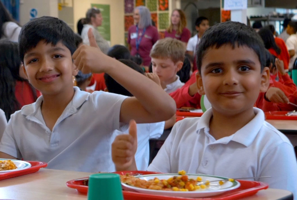 School children eating lunch at school