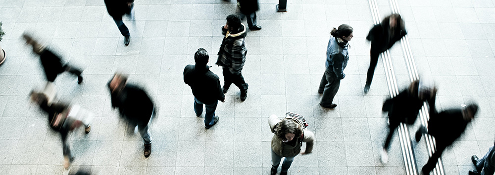 People on a station concourse, from above