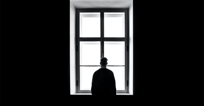 Person looking out of a window