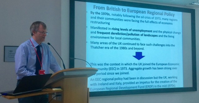 Dr. Sykes outlines the evolution from British to European region policy and the UK role in this evolution 