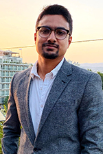 A person posing for a photo.