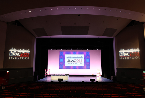 empty lecture theater with LINAC themed screen