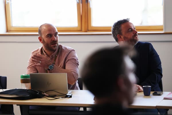 Two people in a meeting