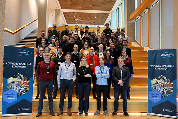 Group of people posing for a photo.